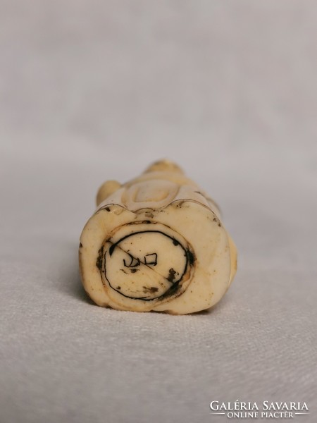 Japanese netsuke bone carving