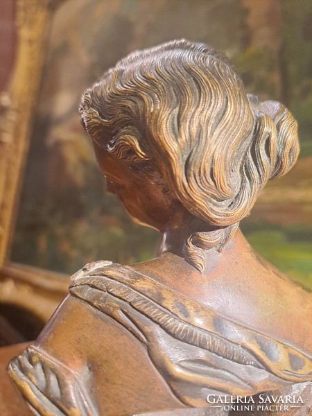 Bronze bust of a young lady. 19th century