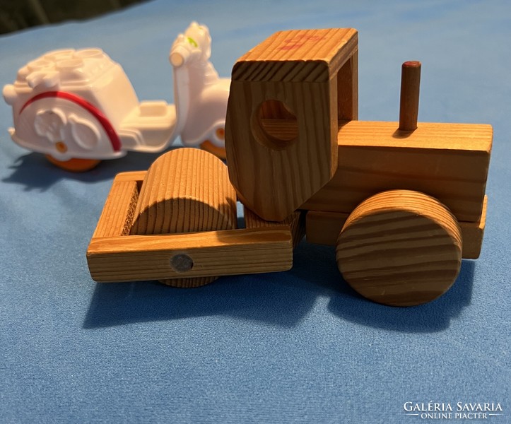 Wooden road roller and plastic molding engine together