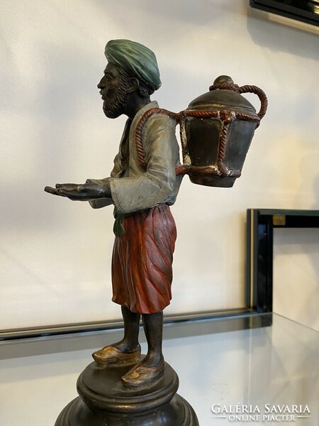 Large Viennese bronze water barrel oriental man