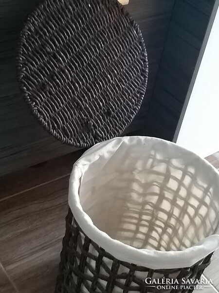 Wicker lined clothes basket storage