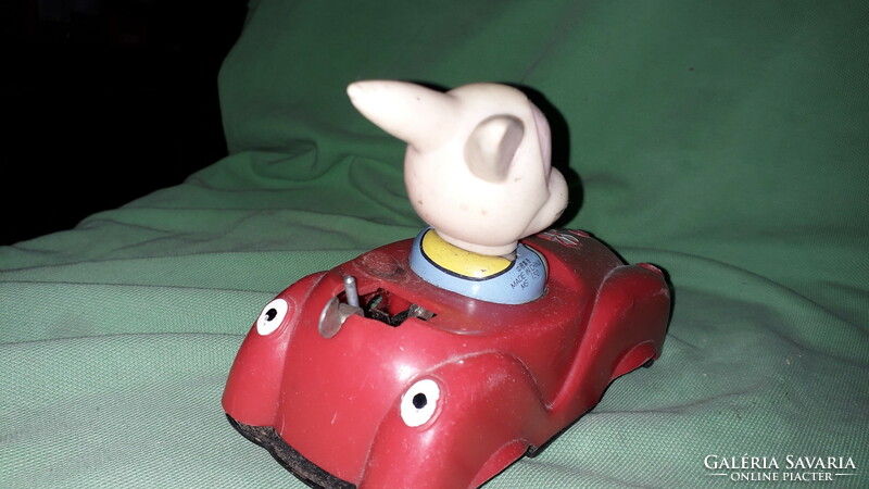 Antique vinyl planet wheel clockwork car with rubber bunny figure 14 x 10 x 8 cm according to pictures