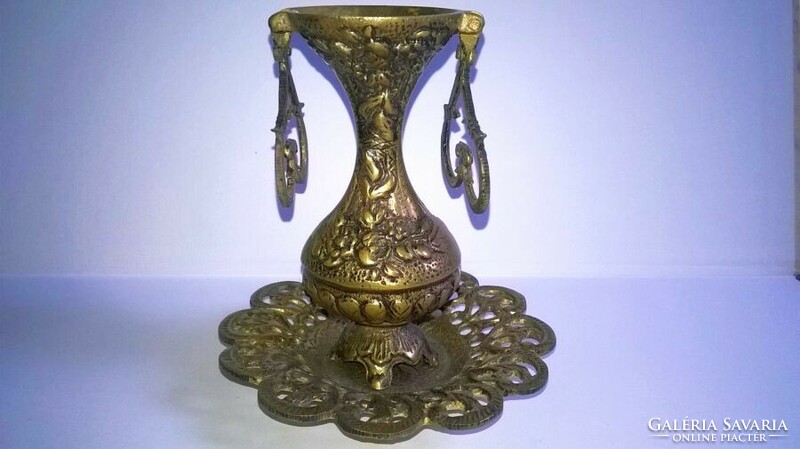 Small, decorative copper vase with coaster