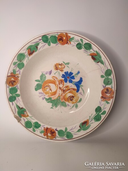 Old painted folk hard terracotta wall plate