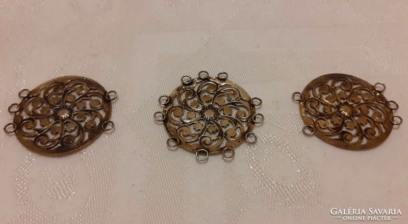3 pieces of copper-colored (or the) clothing ornaments
