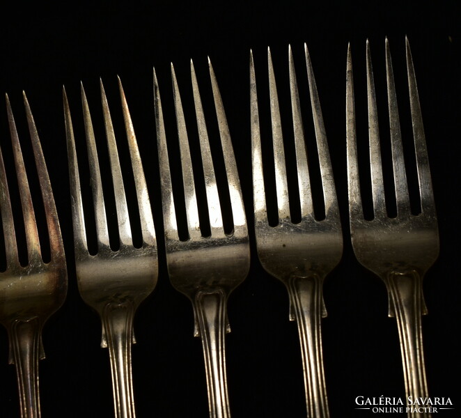 12 thickly silver-plated marked neo-baroque style forks!