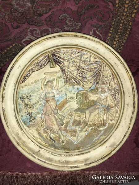 Antique majolica bowl with a plastic figural scene: the dance of Salome