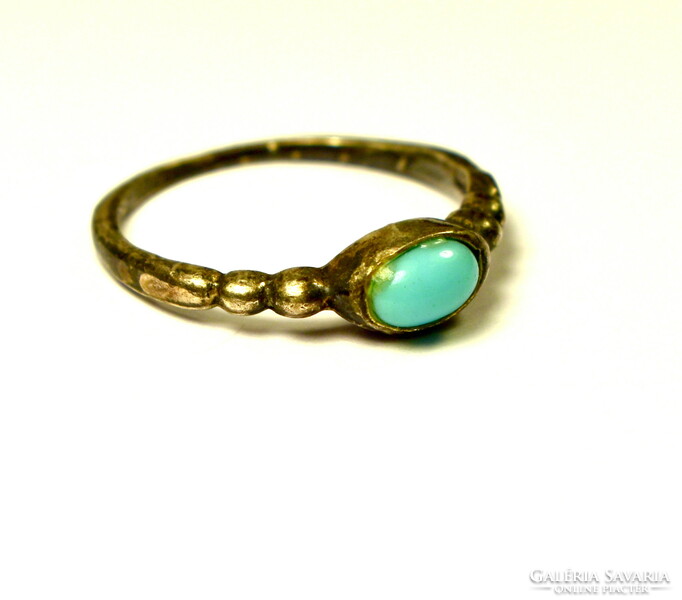 Old silver ring with blue stones