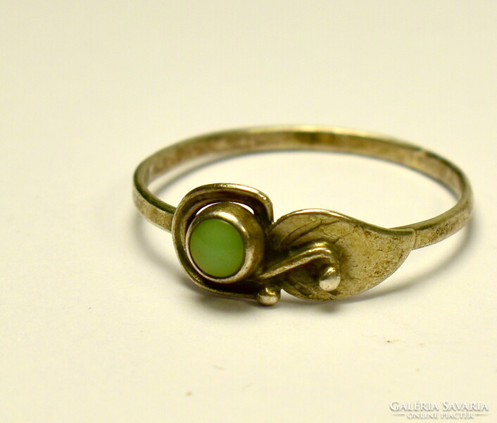 Old silver ring with green stone