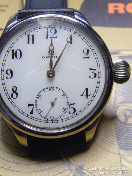 Omega pocket watch built into a steel case, with a serviced structure,