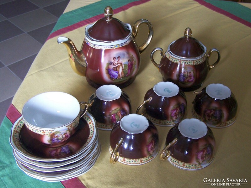 A hinged, old porcelain tea set