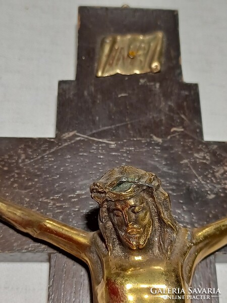 Old wooden cross with copper corpus that can be hung on the wall.