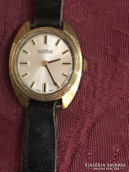 Beautiful gold-plated women's roamer Swiss wristwatch with leather strap