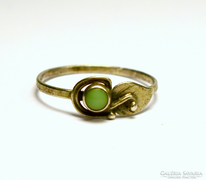 Old silver ring with green stone