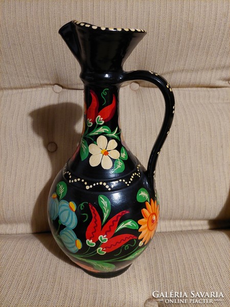 A very beautiful folk, hand-painted jug with a floral motif