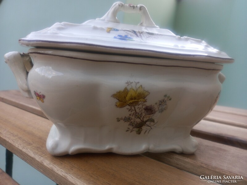 Antique sugar bowl with flower pattern