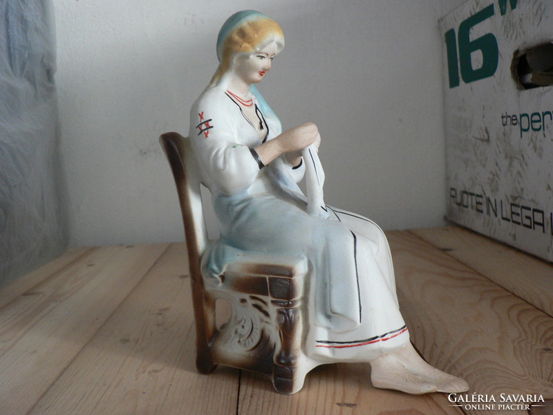 Sewing lady, porcelain statue