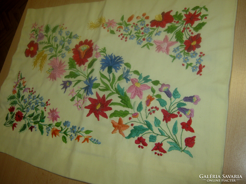 Old embroidered decorative pillow