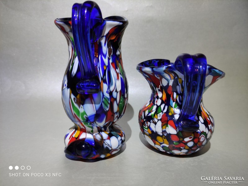 The colorful Millefiori glass vase with spout is priced at two pieces each