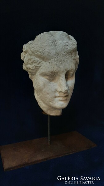 Female head sculpture, ceramic