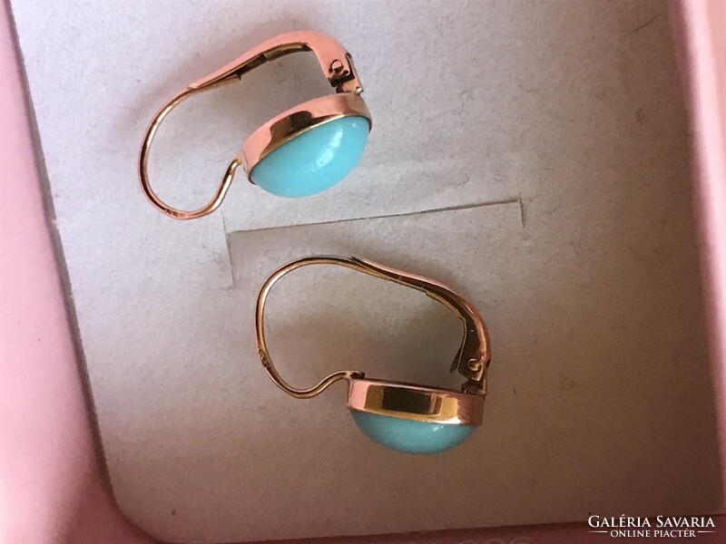 Antique gold earrings with a turquoise stone