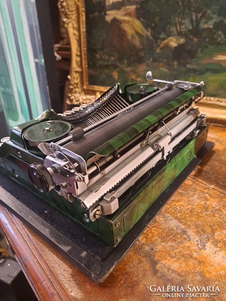 Continental 350 typewriter in green dress around 1930