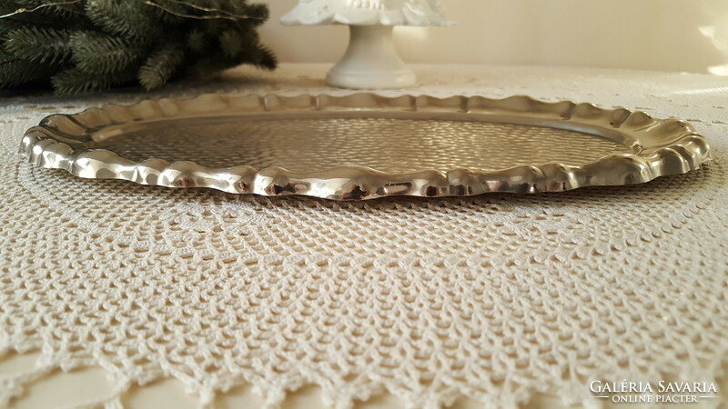 Old oval serving tray with blistered edge, metal tray