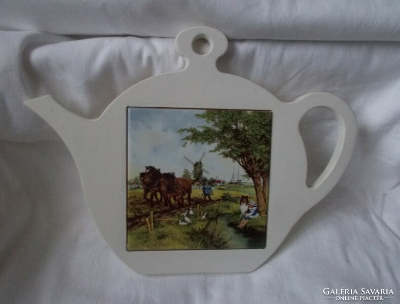 Tile-lined placemat, tea pot-shaped kitchen ornament (equestrian, village scene)