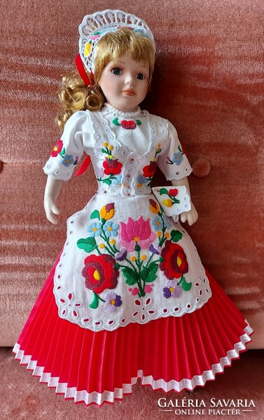 Porcelain doll in Kalocsa folk costume