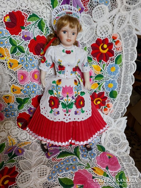 Porcelain doll in Kalocsa folk costume