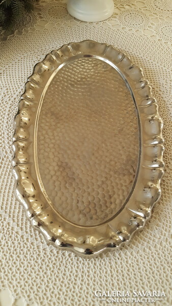 Old oval serving tray with blistered edge, metal tray