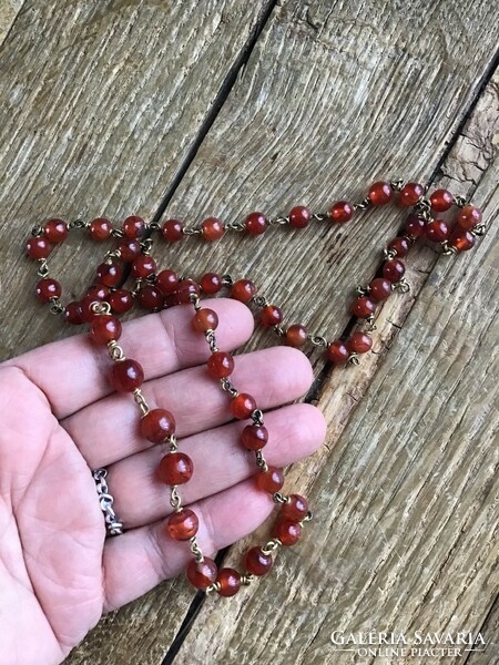 Old carnelian mineral necklace with copper ornaments
