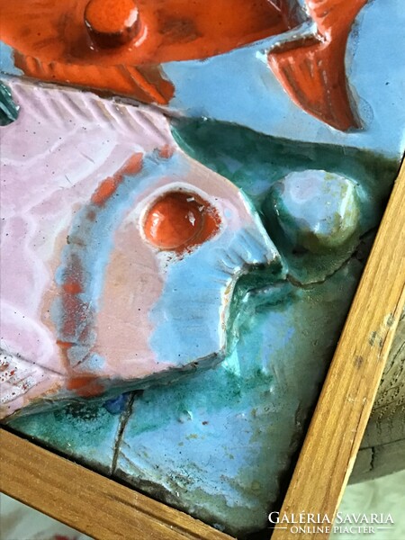 Old special fish wall ceramic picture with a little damage