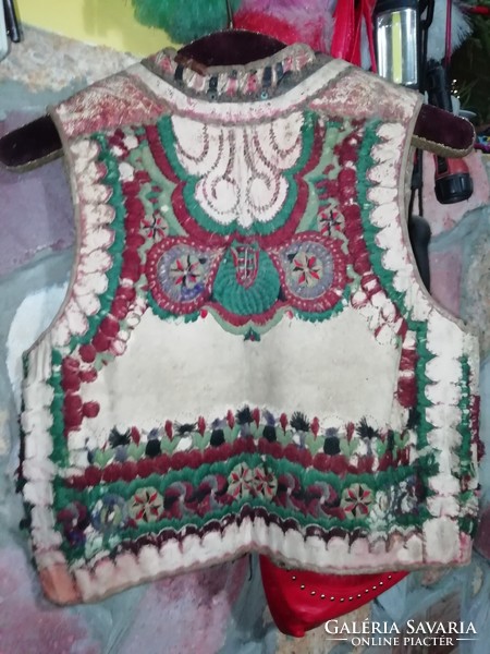 Antique folk waistcoat is in the condition shown in the pictures