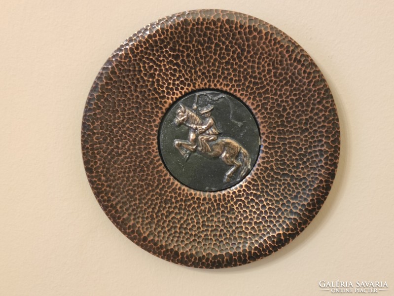 Industrial punched embossed red copper wall bowl with a teasing horse outlaw theme in the middle