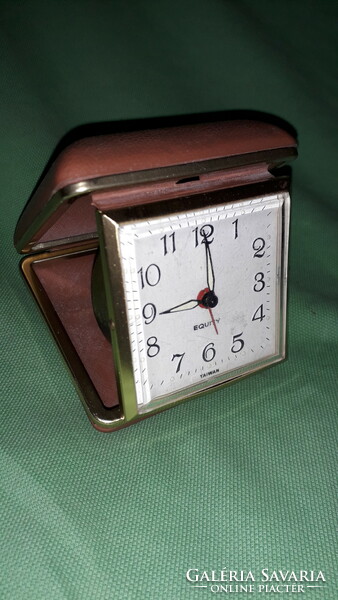 Old traveling compact waltham equity desk clock with leather case needs to be repaired according to the pictures