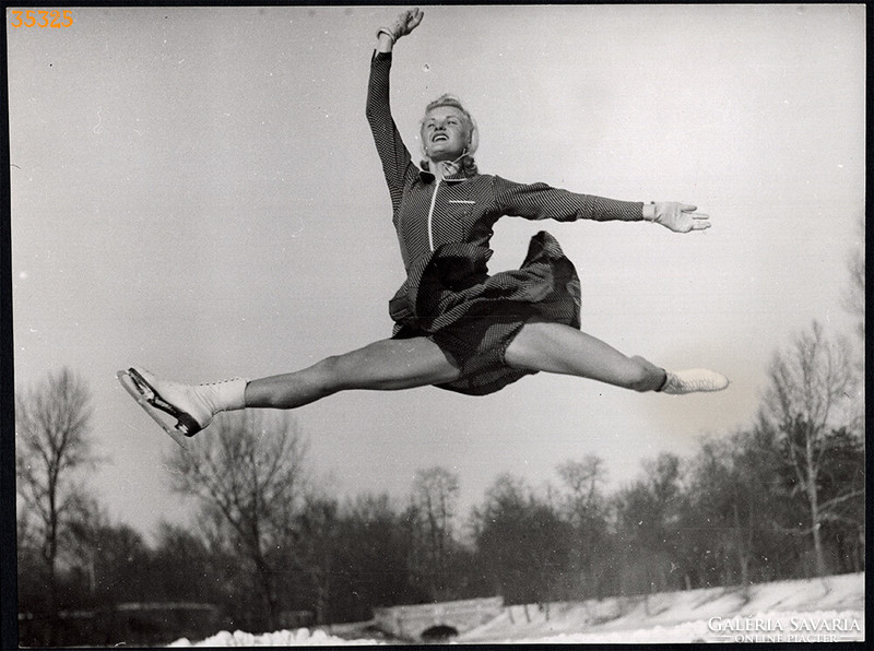 Larger size, photo art work by István Szendrő. Figure skater in the air, 1930s.