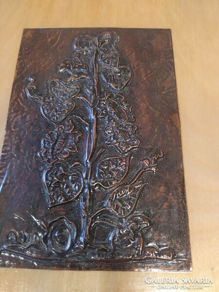 Bronze relief by István Adorján on a wooden plate