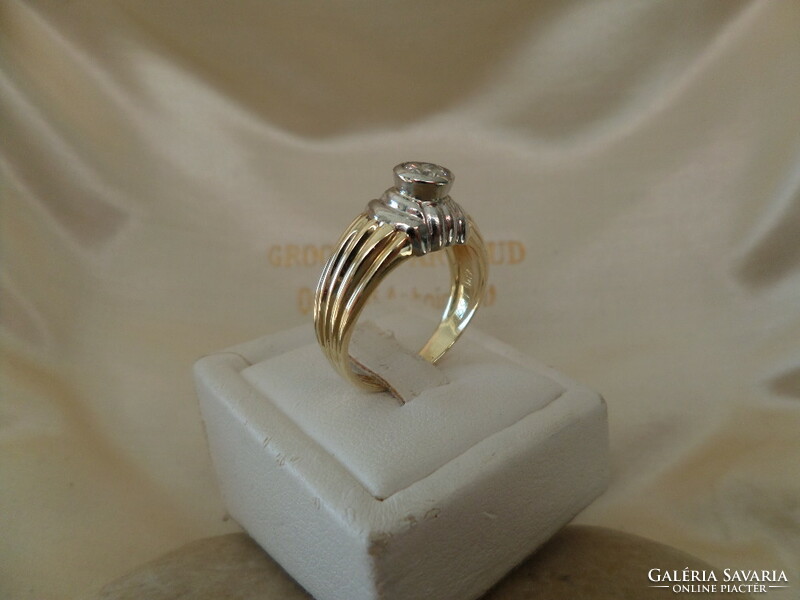 Yellow - white gold ring with 0.35 Ct brill