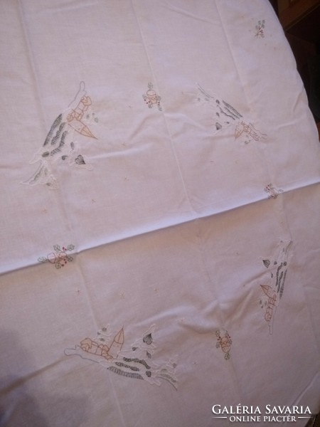 5 embroidered Christmas tablecloths, together and separately