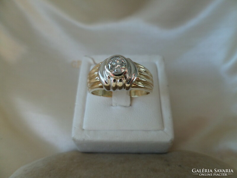 Yellow - white gold ring with 0.35 Ct brill