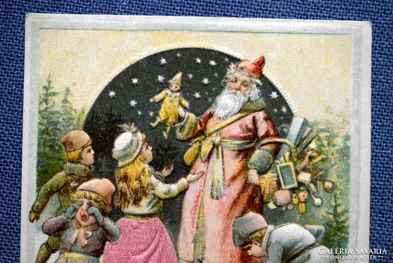 Antik dombornyomott Karácsonyi üdvözlő képeslap -Mikulás, kisgyerekek, játékok selyem anyagú ruha