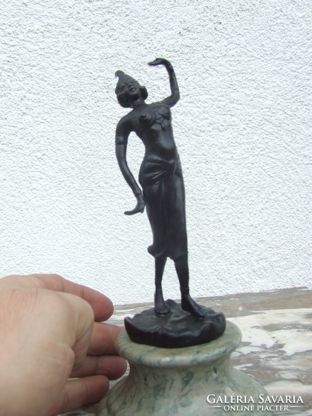 Dancing woman iron statue