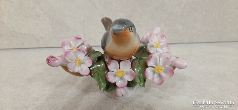 Herend porcelain bird on a blossoming cherry tree branch