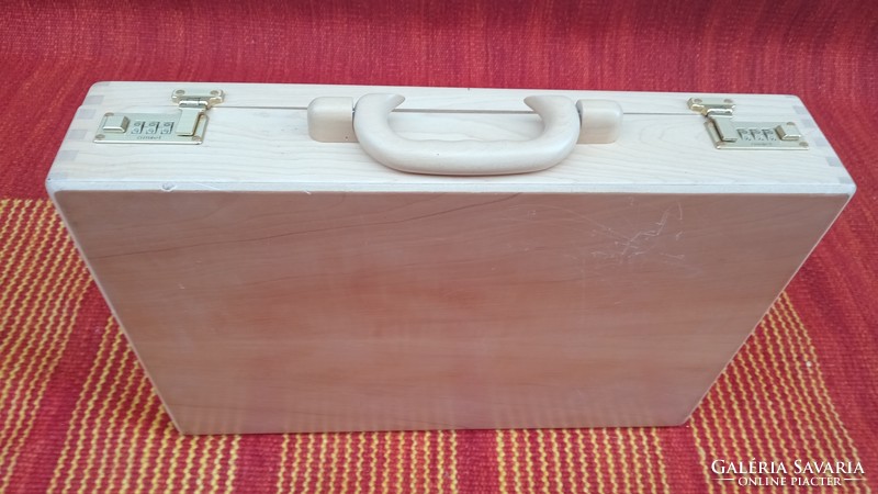 Vintage amiet wood briefcase with 3-digit code and pockets. Negotiable!