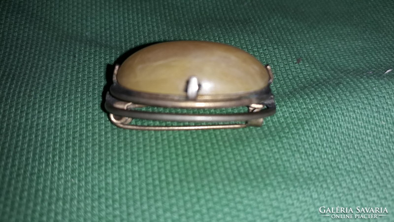 Antique very nice hat pin brooch with a jade-like stone in a silver-plated socket, as shown in the pictures