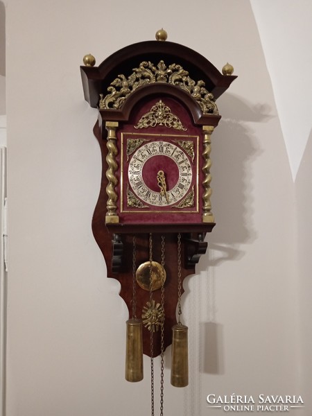 A rare, beautiful, half-baked pendulum Dutch wall clock. With copper columns, ornaments, Roman dial.