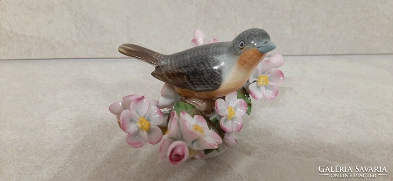 Herend porcelain bird on a blossoming cherry tree branch