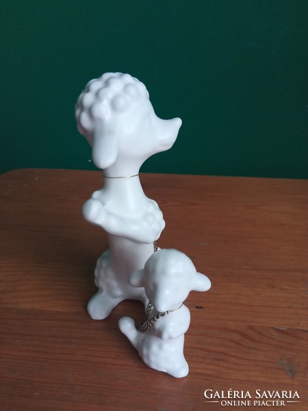 Pair of vintage white porcelain poodle dogs