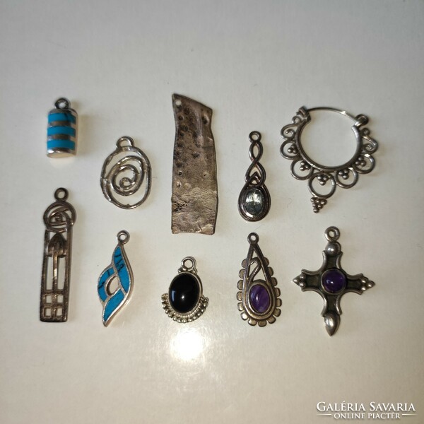 Half a pair of silver earrings with pendants